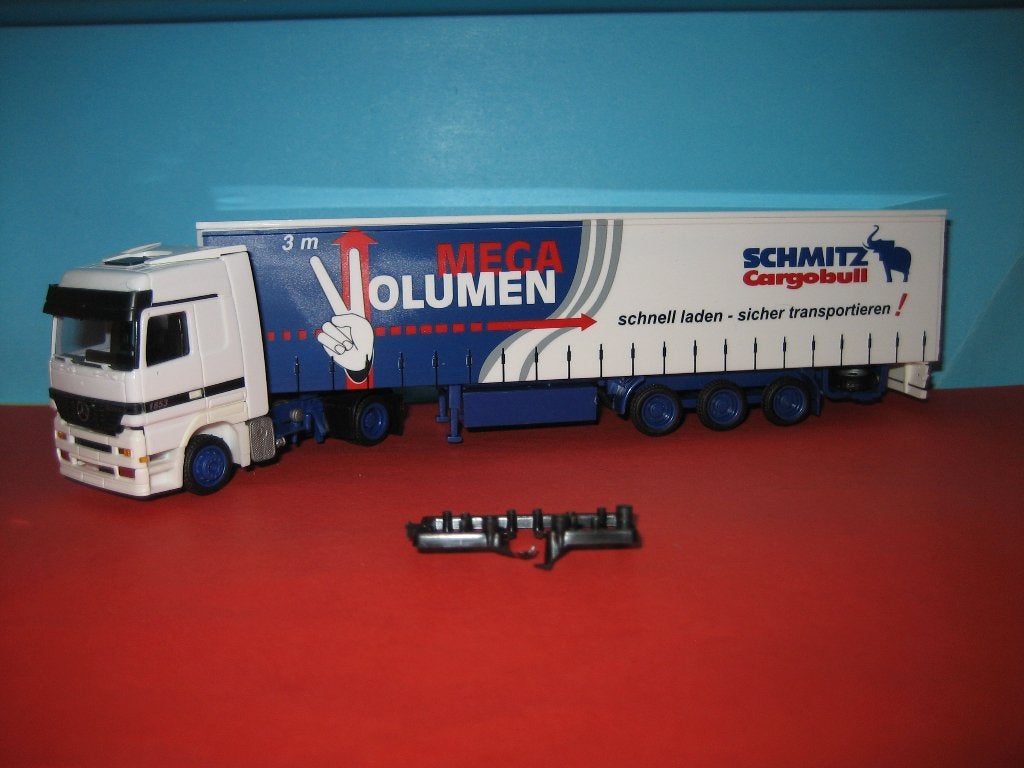 Schmitz  Mega-Volume  MERCEDES 1853  AWM, Hobby en Vrije tijd, Modelauto's | 1:87, Ophalen of Verzenden, Zo goed als nieuw, Bus of Vrachtwagen