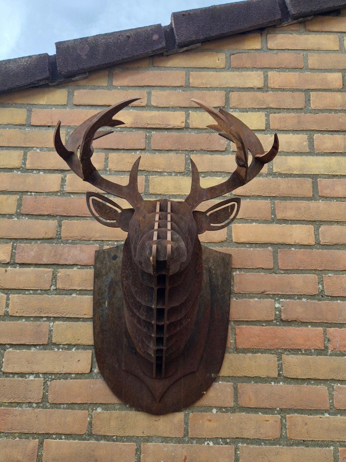 cortenstaal hertenkop, Ophalen