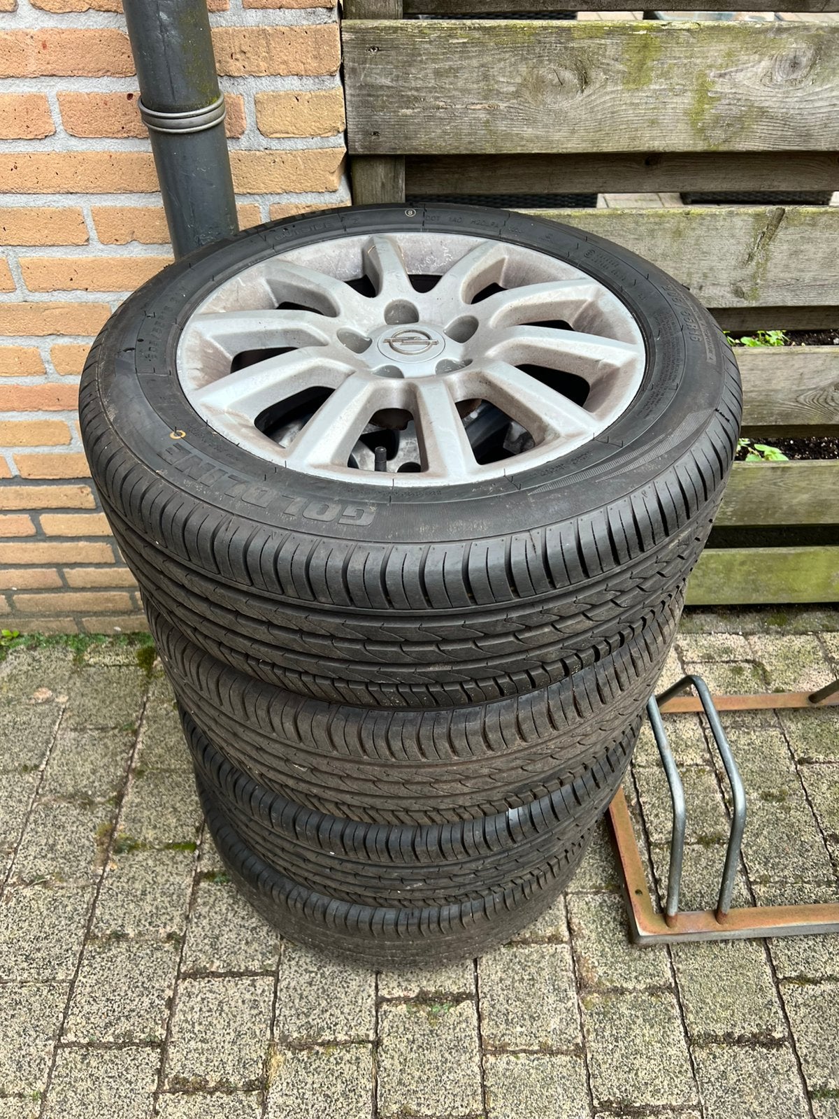 set van 4 lichtmetalen velgen met banden van opel astra h, Ophalen, Gebruikt, Opel