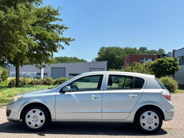 Opel Astra 1.4 Essentia 5-Drs Airco Elec. pakket Colorpakket, Auto's, Voorwielaandrijving, Dealer onderhouden, Stof, Gebruikt