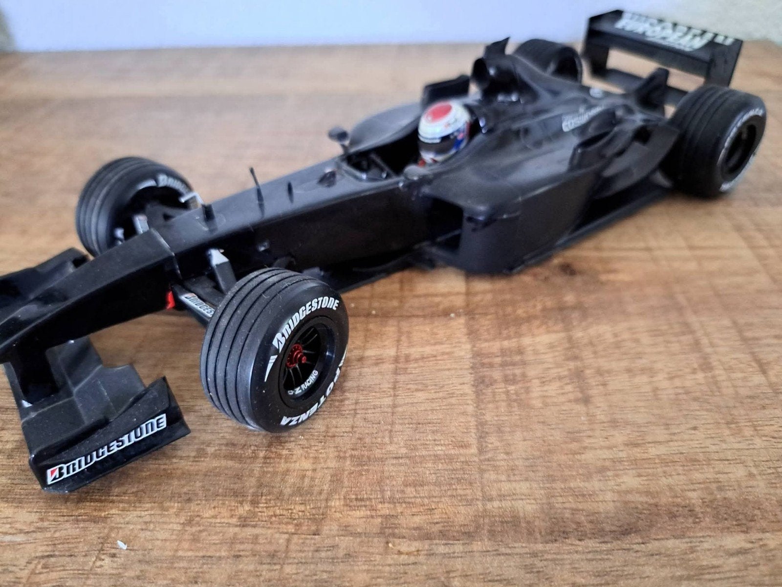 Minichamps 1:18 modelauto van de Minardi PS01 testauto., Ophalen of Verzenden, Bburago
