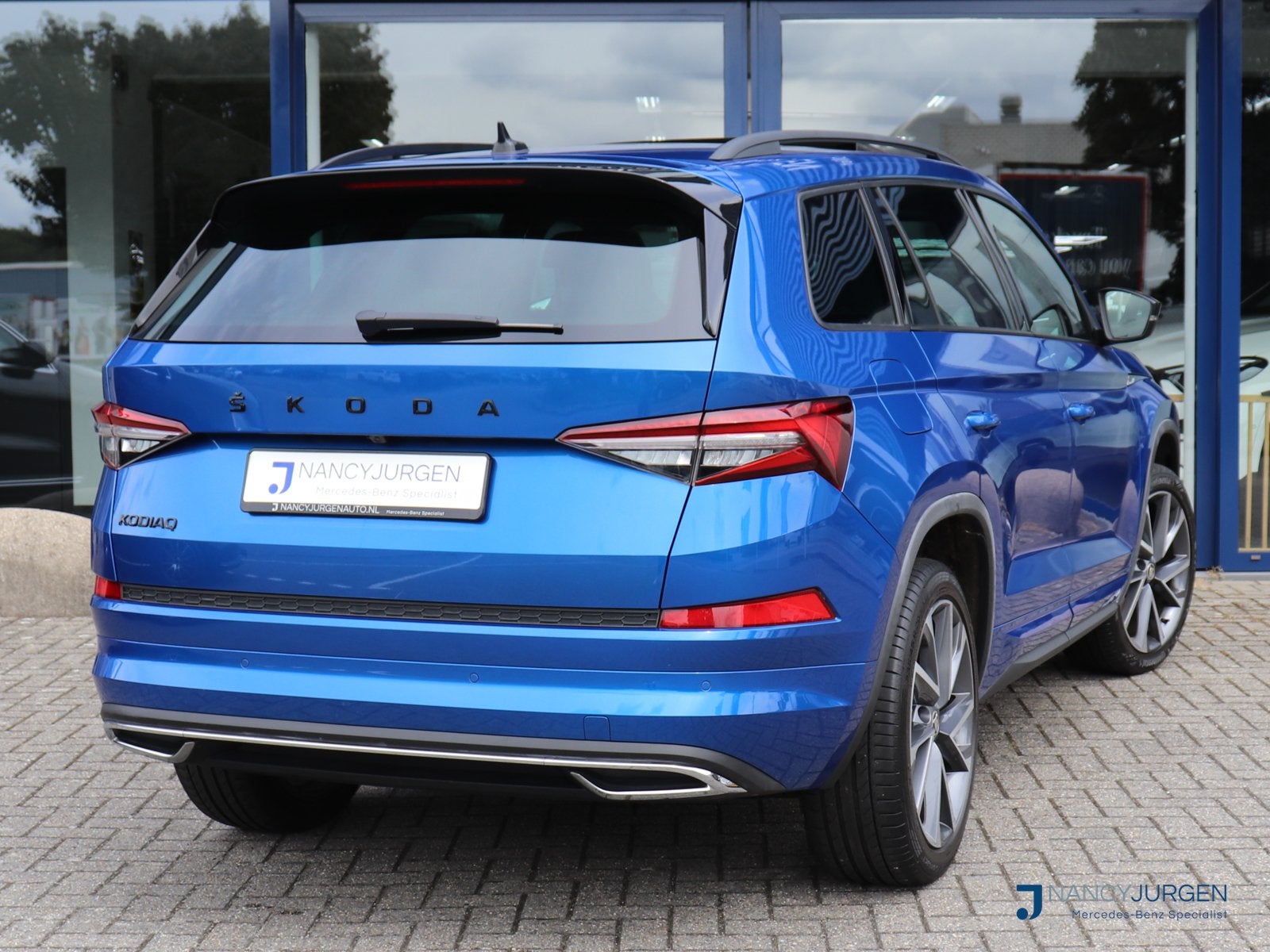 Skoda Kodiaq 1.5 TSI | Sportline | Business | Pano | Camera, Auto's, 4 cilinders, Blauw, Bedrijf, Kodiaq