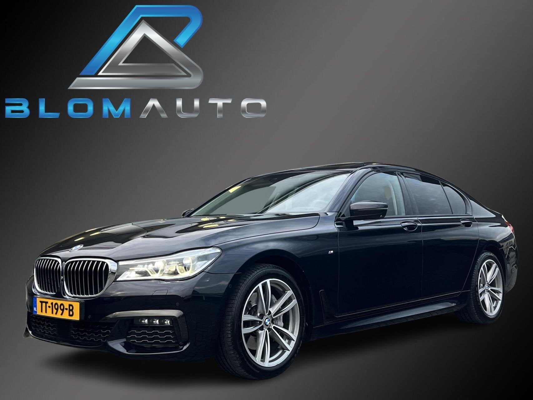 BMW 7-serie 740i M-SPORT ZEER COMPLEET! MASSAGE+SUNROOF+ACC, Auto's, Automaat, Gebruikt, 1700 kg, Zwart