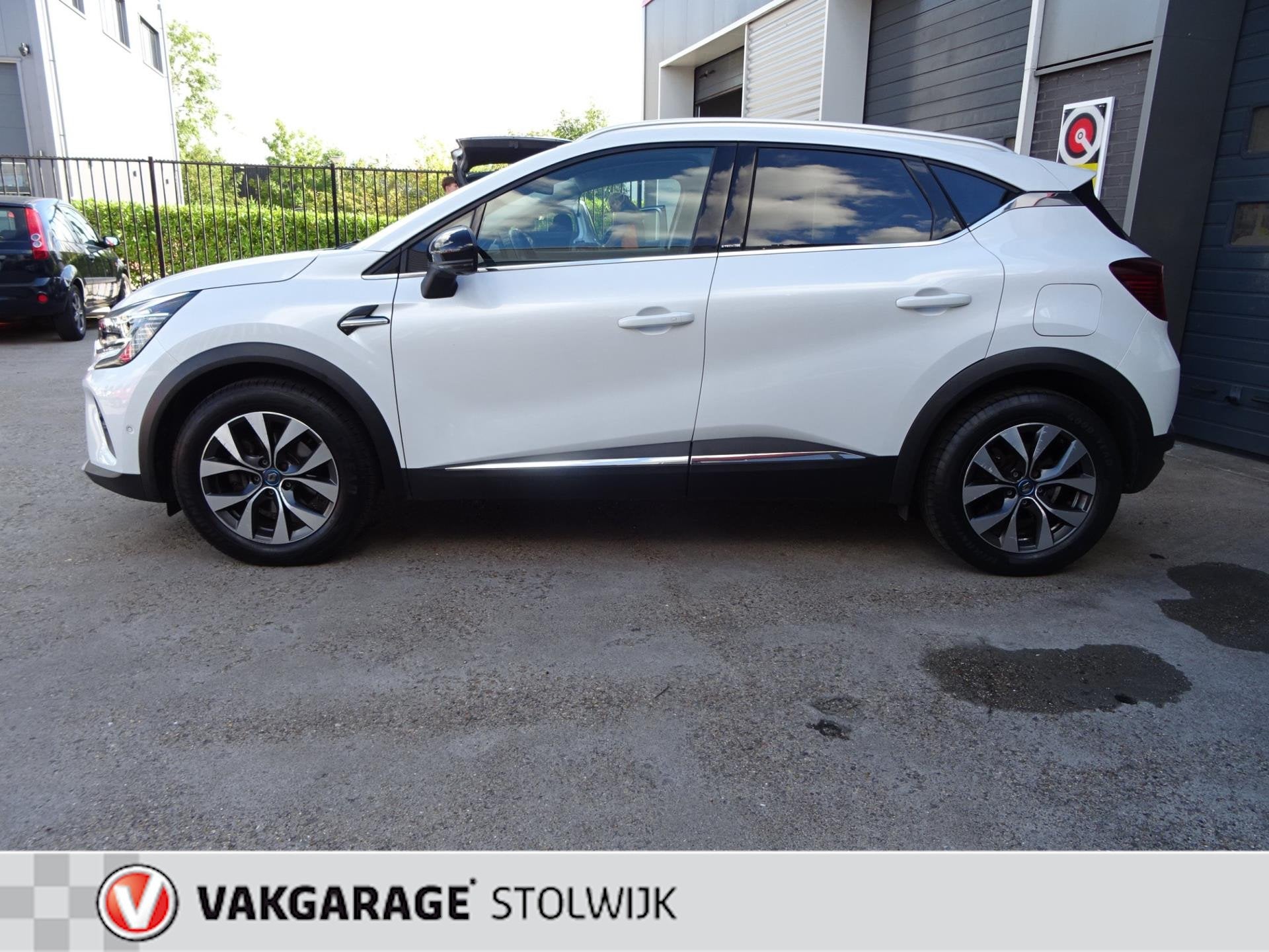 Renault Captur 1.6 E-Tech Plug-in Hybrid 160 Intens, Parelmo, Auto's, Renault, 77 km/l, Gebruikt, 4 cilinders, Leder en Stof