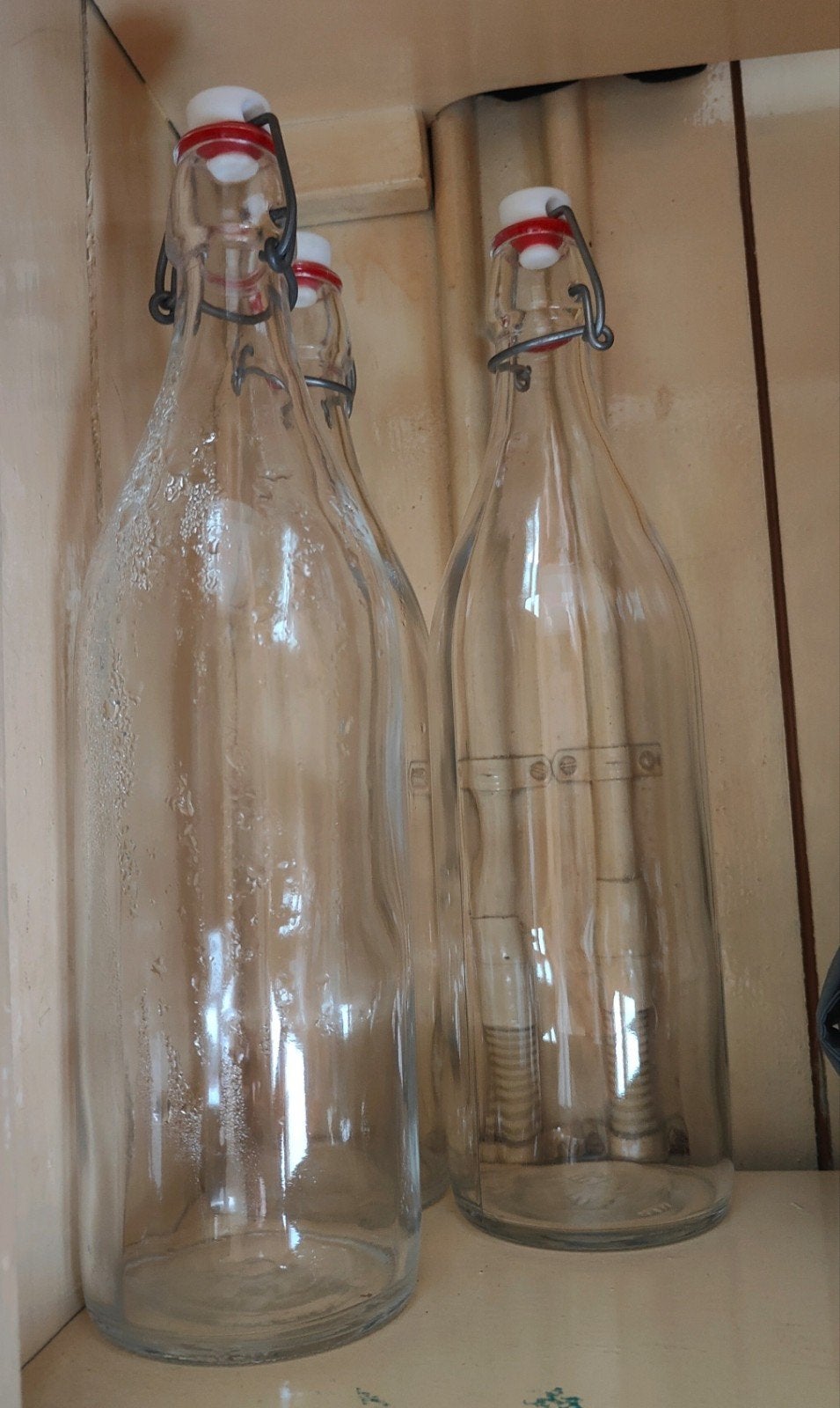 4 glazen flessen, Inhoud: 1 liter, Ophalen