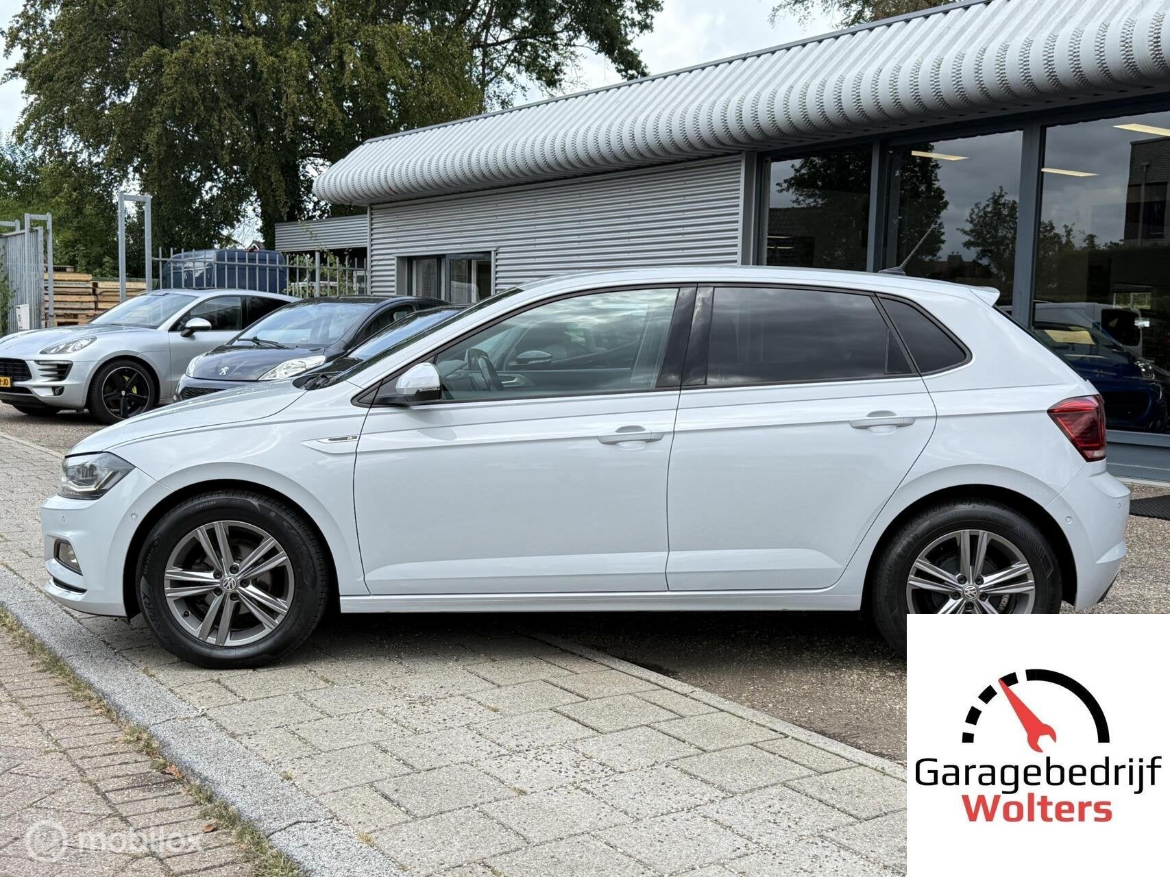 Volkswagen Polo 1.0 TSI Highline R-LINE AUTOMAAT STOELVERWAR, Auto's, Stof, Gebruikt, 95 pk, Met garantie (alle)