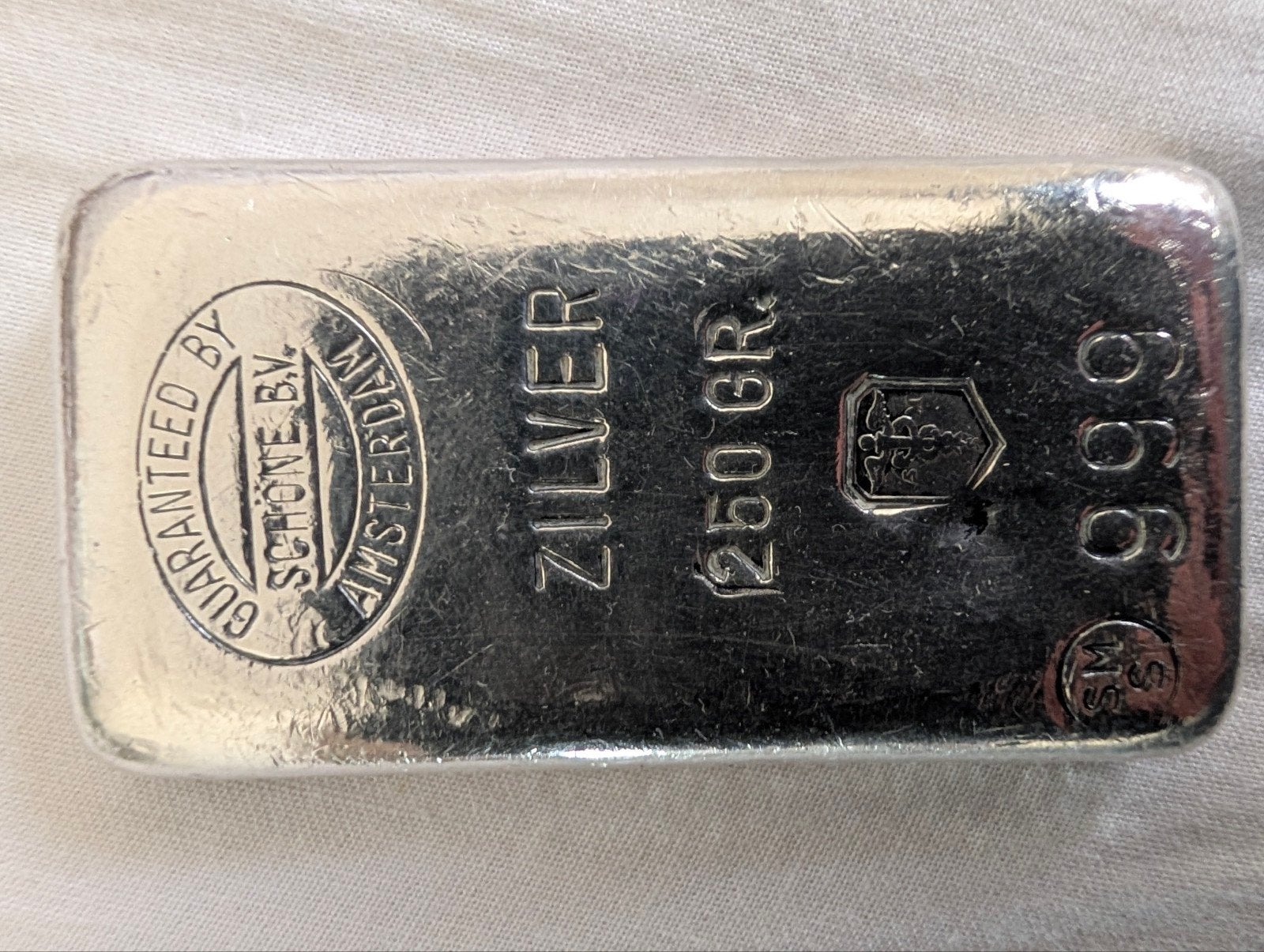 Zilverbaar 250 gram 999 Schone B.V. Amsterdam, Postzegels en Munten, Edelmetalen en Baren, Verzenden, Zilver