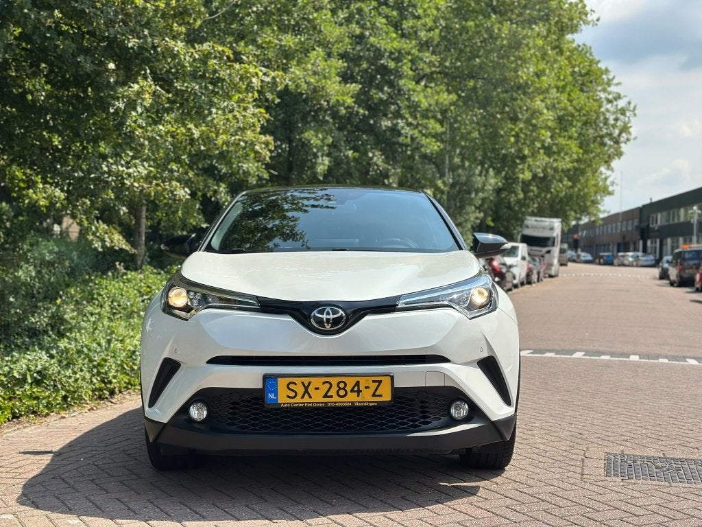 Toyota C-HR 1.2 Executive Bi-Tone Mag 1100KG Trekken, Auto's, Toyota, Automaat, 12 maanden, Gebruikt, Euro 6