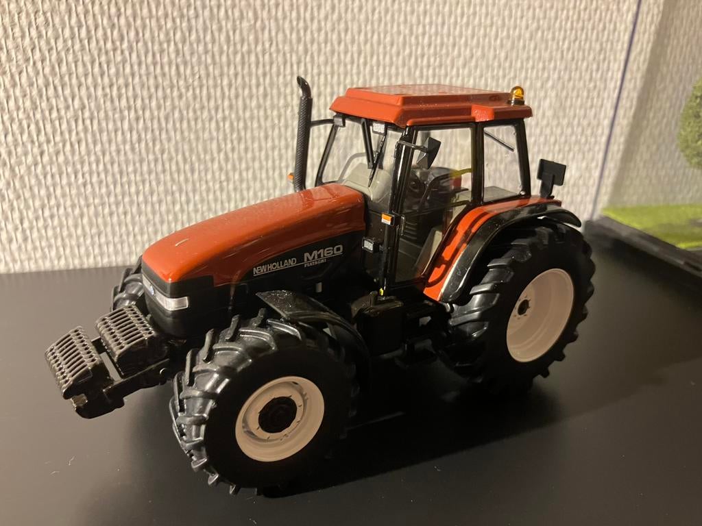 new holland M160 Replicagri 1:32, Ophalen of Verzenden, Zo goed als nieuw, Tractor of Landbouw, Overige merken