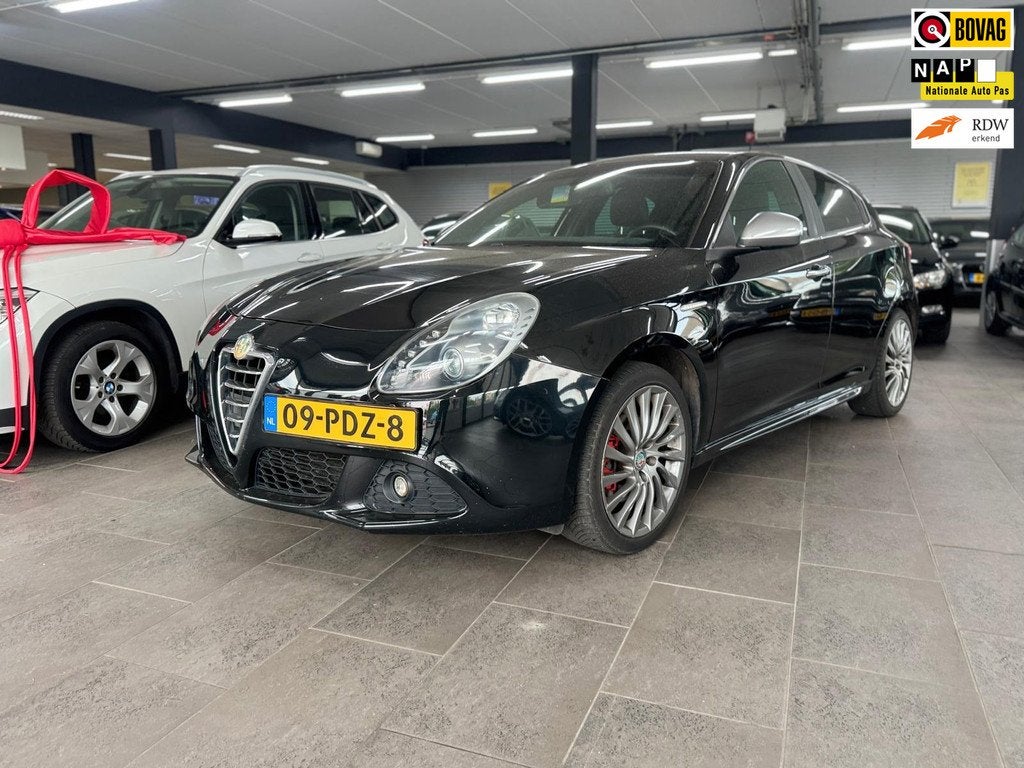 Alfa Romeo Giulietta 1.4 T Distinctive half leer navigatie C, Auto's, Alfa Romeo, Voorwielaandrijving, Euro 5, Gebruikt, Zwart
