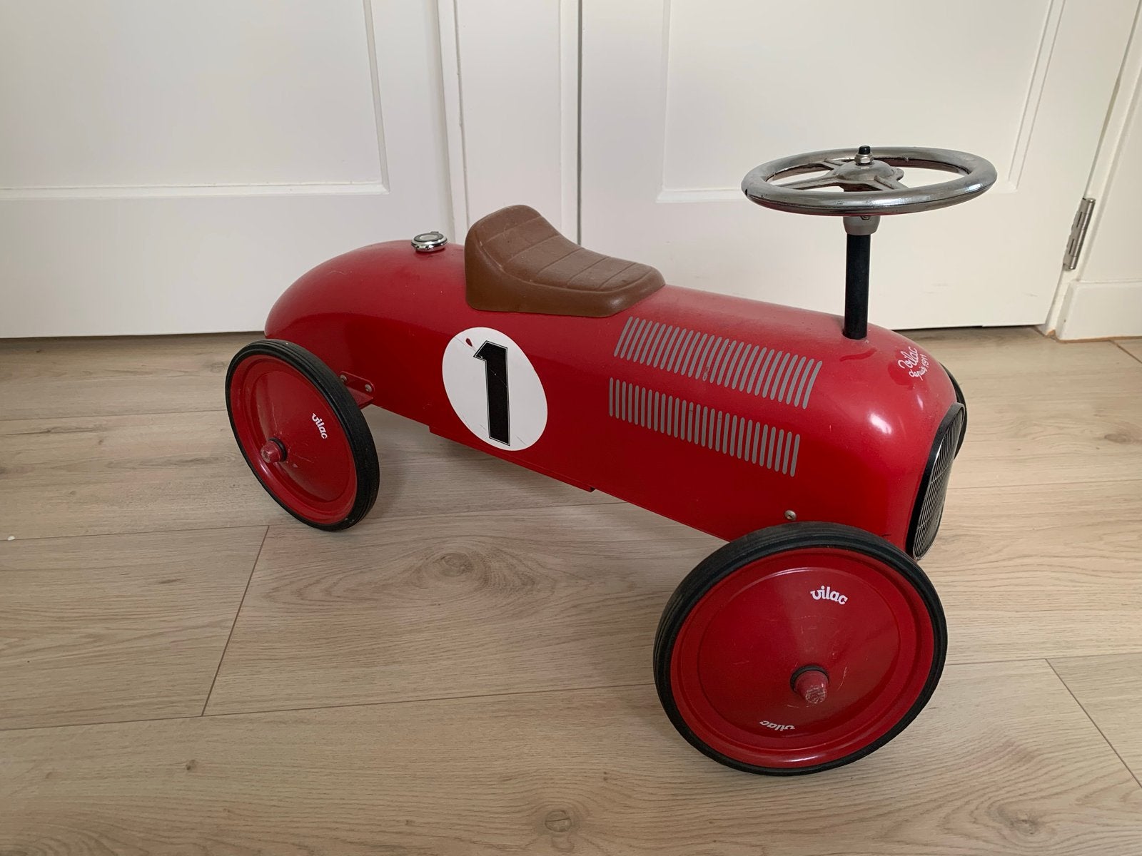 Rode Loopauto Raceauto Nr. 1, Ophalen