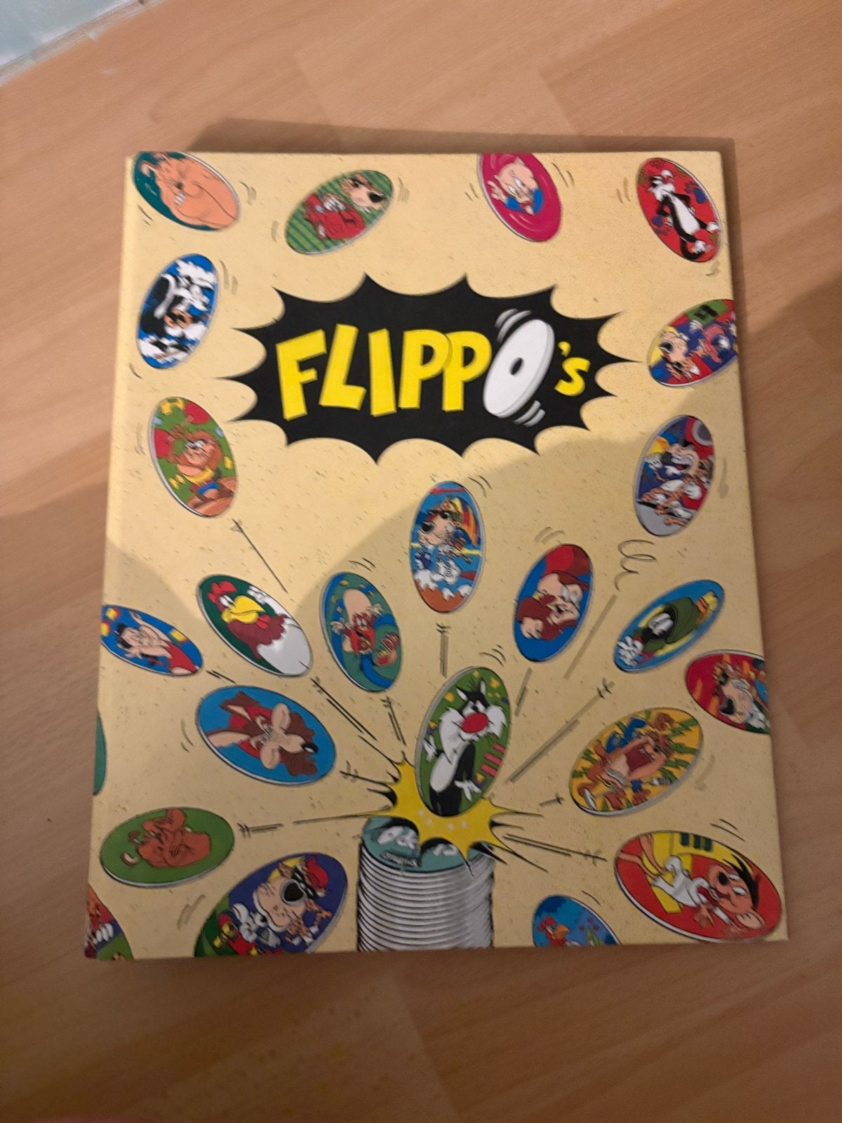 Flippo's verzamelmap met Looney Tunes Flippo's, Ophalen of Verzenden, Looney Tunes, Verzameling, Met verzamelmap(pen)