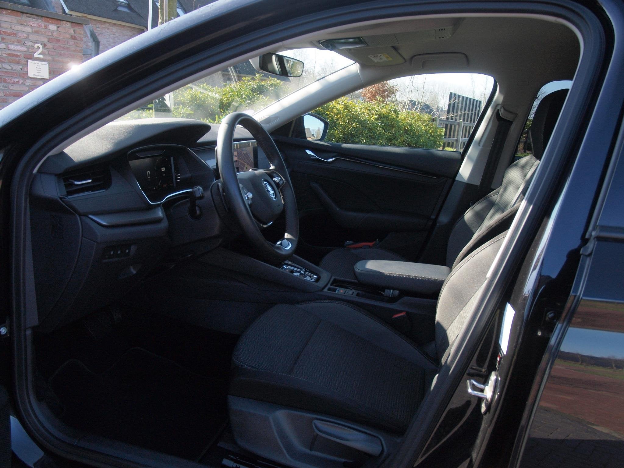 Skoda Octavia Combi 1.0 e-TSI Business Edition | DSG - Autom, Auto's, Skoda, Stof, Gebruikt, Zwart, 19 km/l