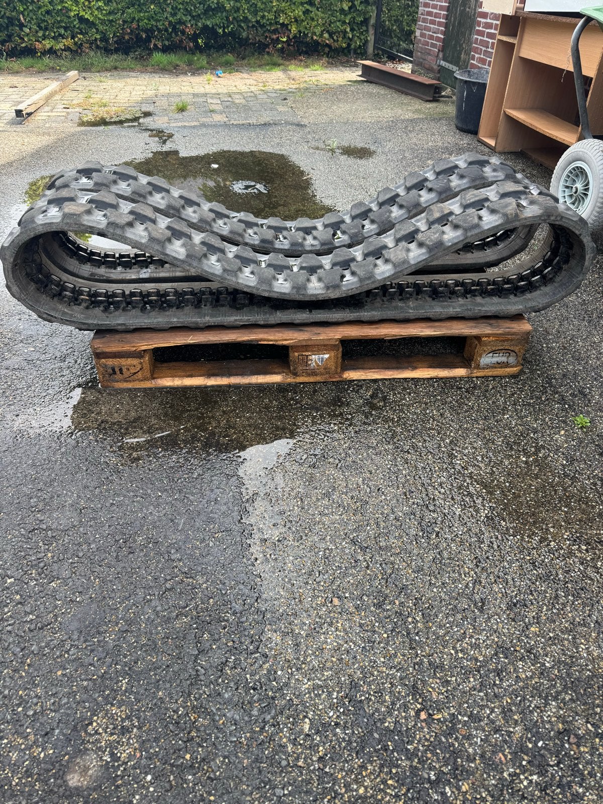 Rubberen rupsband voor minigraver of dumper, Ophalen