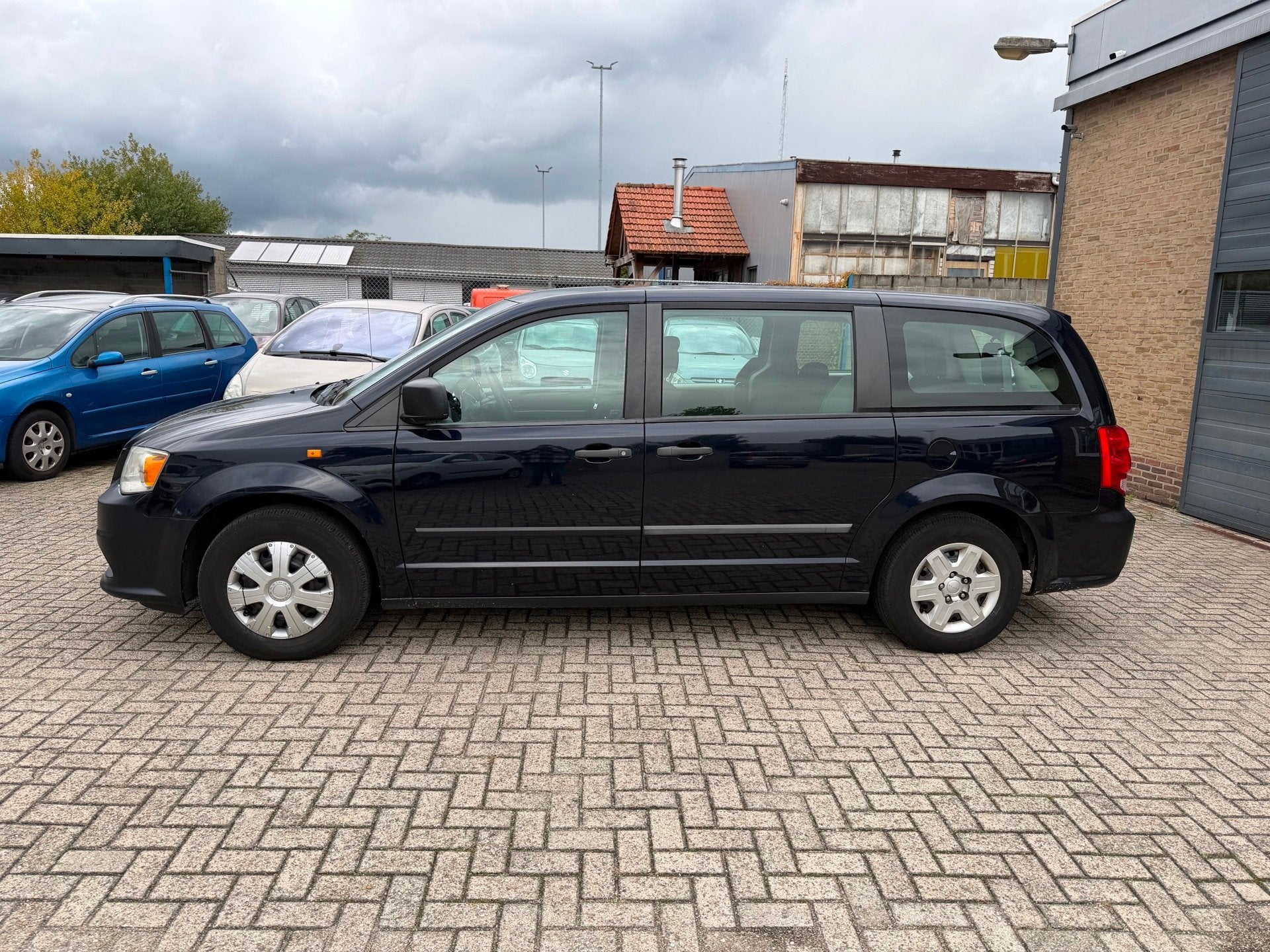 Dodge Grand Caravan 3.6 V6// goede auto// Leest tekst, Auto's, Euro 5, Zwart, Blauw, 7 stoelen