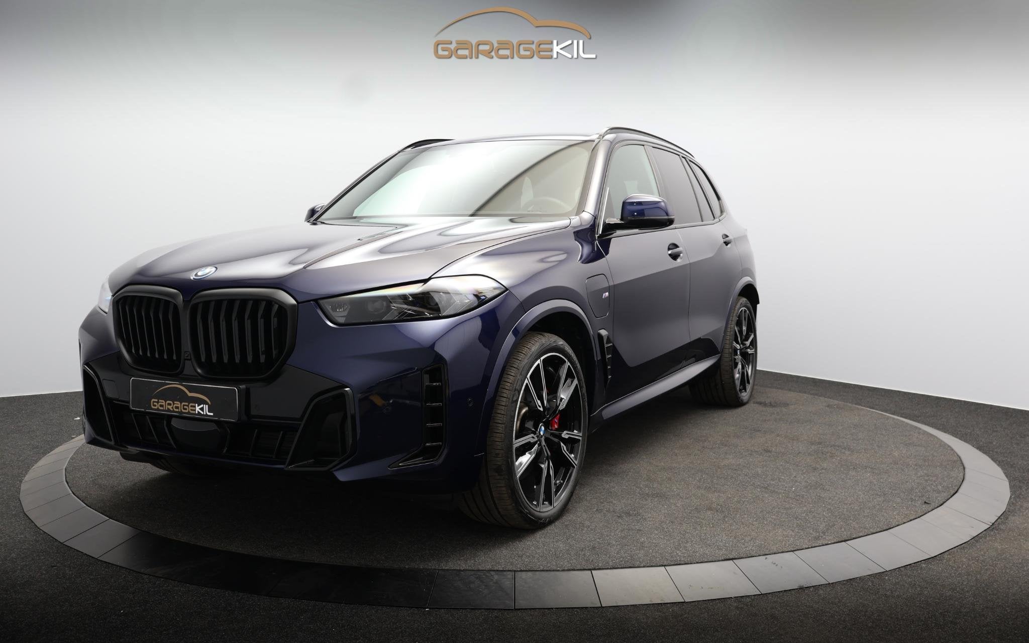 BMW X5 xDrive50e M-sport Pro / Dealeronderh / Comfort Stoele, Auto's, Automaat, Gebruikt, 2395 kg, Blauw