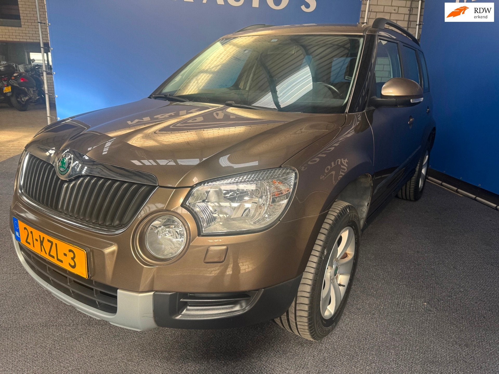 Skoda Yeti 1.2 TSI Ambition Nieuwe APK, Auto's, Voorwielaandrijving, Euro 5, Stof, Gebruikt