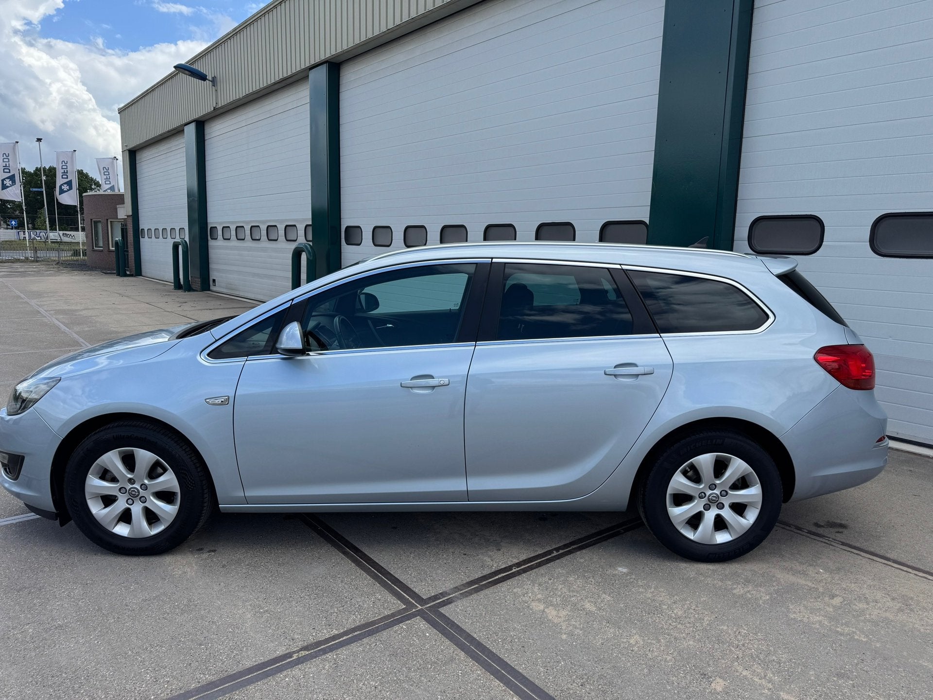 Opel Astra Sports Tourer 1.4 Turbo Edition, Auto's, Voorwielaandrijving, Stof, 4 cilinders, Origineel Nederlands