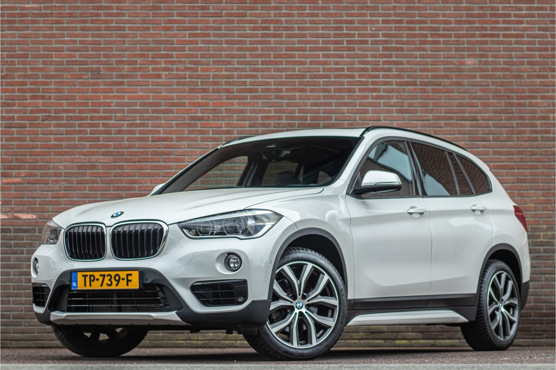 BMW X1 sDrive20i High Executive, 63.000km NAP, Sport Line, P, Auto's, 1998 cc, Euro 6, Wit, 1455 kg
