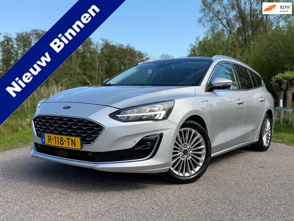 Ford Focus Wagon 1.0 EcoBoost Vignale Automaat / Panoramadak, Auto's, Ford, 125 pk, Gebruikt, Leder, Lichtsensor