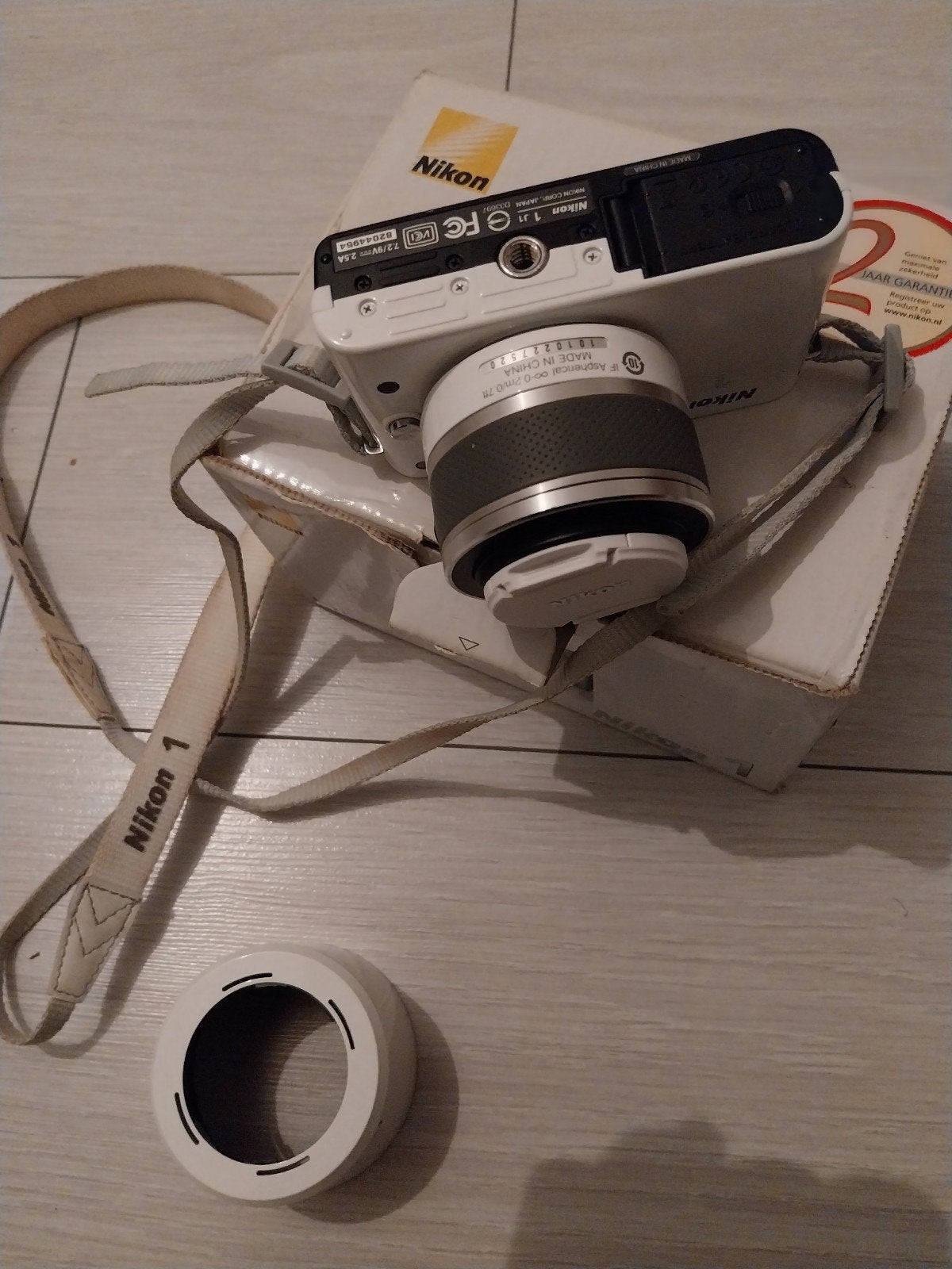 Nikon 1 J1 Systeemcamera met 10-30mm lens, Gebruikt, Ophalen of Verzenden, Nikon, Draagriem