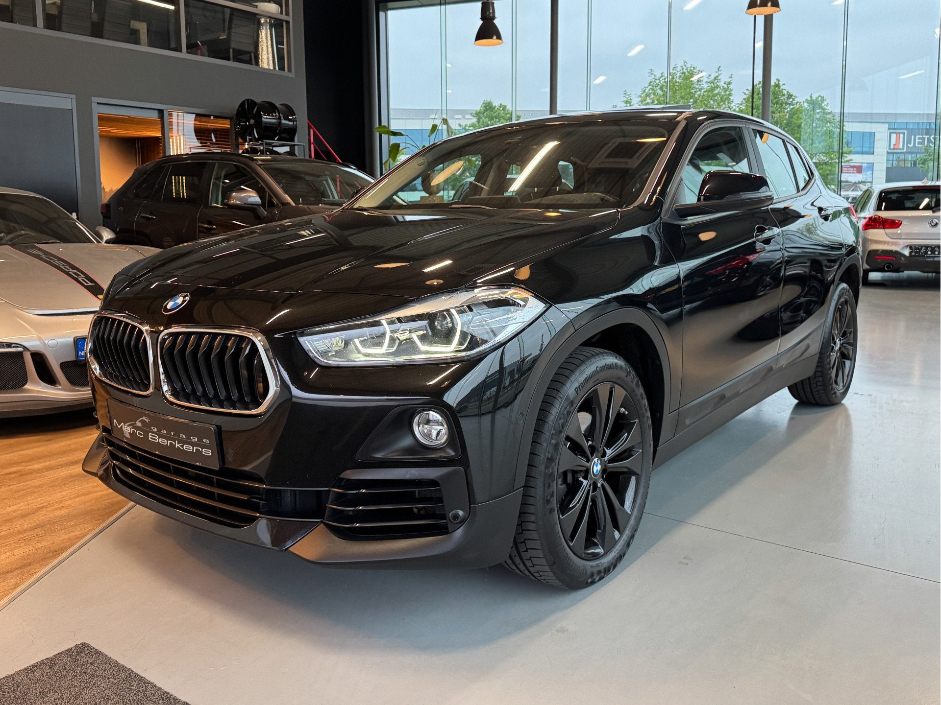 BMW X2 sDrive18i High Exe aut. Pano HUD stoelverw., Auto's, Gebruikt, Zwart, 3 cilinders, Geïmporteerd