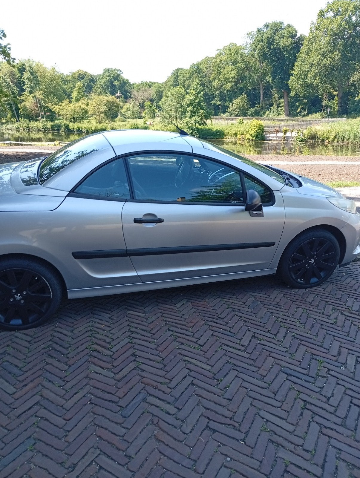 Peugeot 207 1.6 16V CC 110KW 2007 Grijs, Auto's, Voorwielaandrijving, 4 cilinders, Cabriolet, 4 stoelen