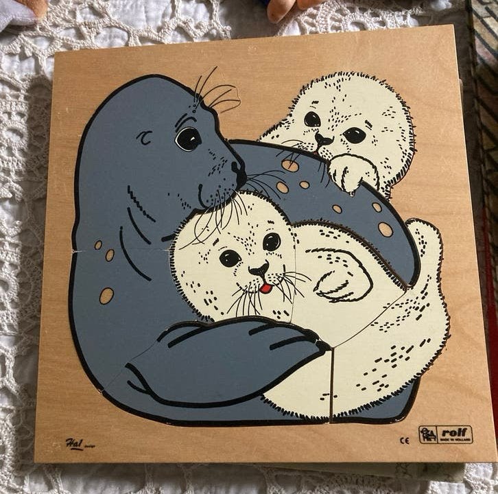 Houten Rolf puzzel met zeehonden 9 stukken., 2 tot 4 jaar, Gebruikt, Ophalen of Verzenden, Van hout