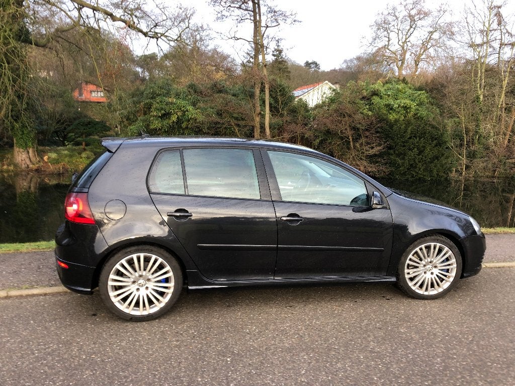 Volkswagen Golf 3.2 V6 184KW R32 5D 4M AUT 2006 Zwart, Auto's, Automaat, Dealer onderhouden, Stof, 3189 cc