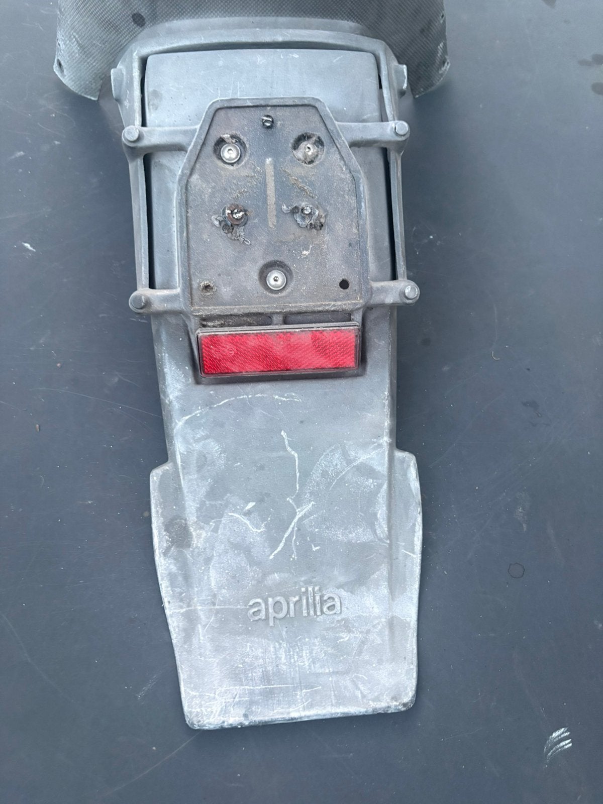 Aprilia sr achterlicht/kentekenhouder, Ophalen of Verzenden, Zo goed als nieuw, Transport