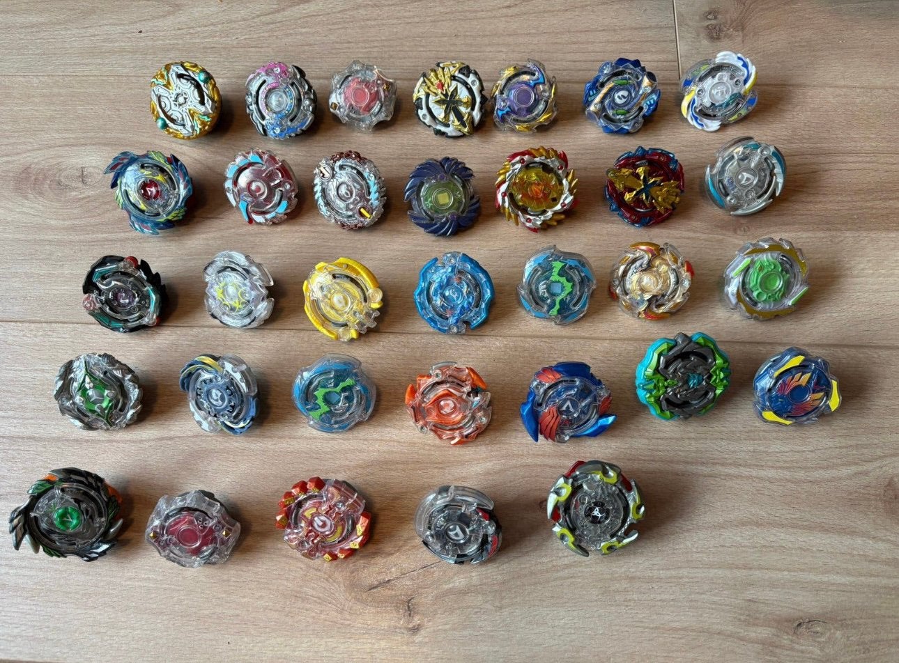 Collectie beyblades inclusief arenas en launchers, Overige merken, Overige materialen, Verzenden, Zo goed als nieuw