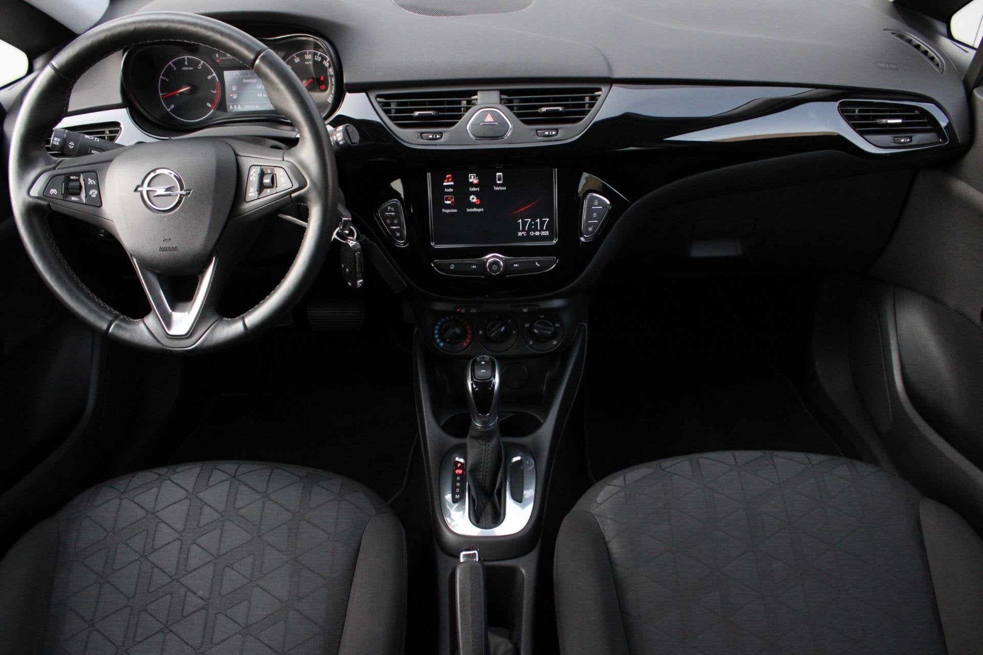 Opel Corsa 1.4 120 Jahre VOL AUTOMAAT I CARPLAY I CAMERA I S, Auto's, Stof, Gebruikt, 4 cilinders, Bedrijf