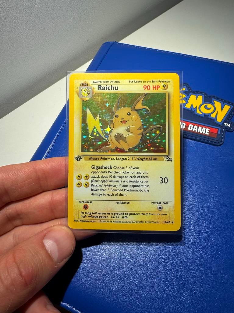 Raichu Fossil 1st Edition Pokémon kaart, Ophalen of Verzenden, Gebruikt, Losse kaart, Foil