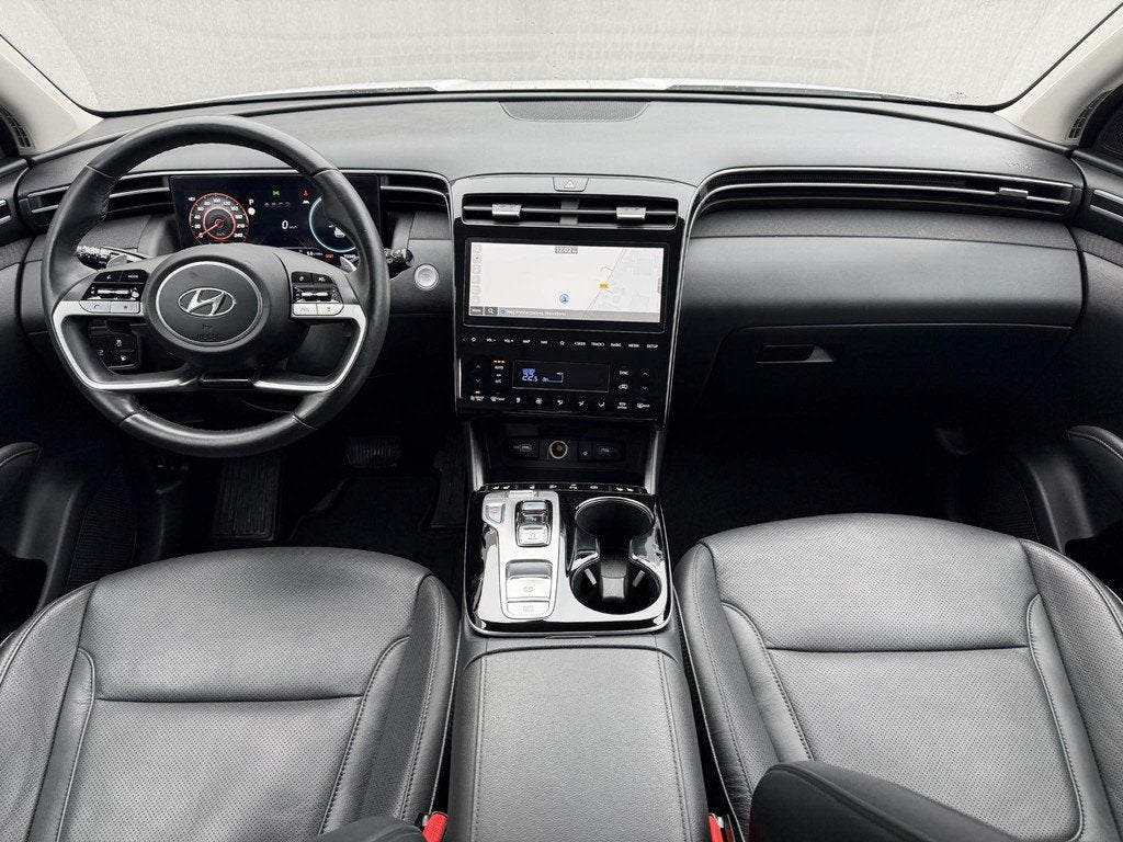 Hyundai Tucson 1.6 T-GDI PHEV Premium Sky 4WD / Dealer Onder, Auto's, Hyundai, 1350 kg, 14 kWh, Gebruikt, Euro 6