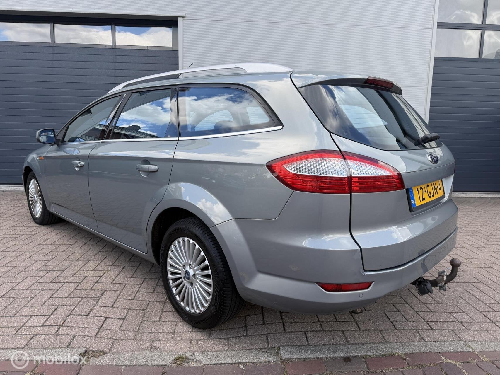 Ford Mondeo Wagon 2.3-16V Titanium AUTOMAAT/NAVI/TREKHAAK, Auto's, Gebruikt, 4 cilinders, Mondeo, 160 pk