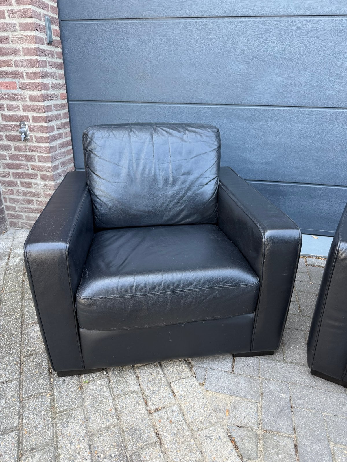 Twee zwarte leren fauteuils, Ophalen, Gebruikt, Leer, 75 tot 100 cm