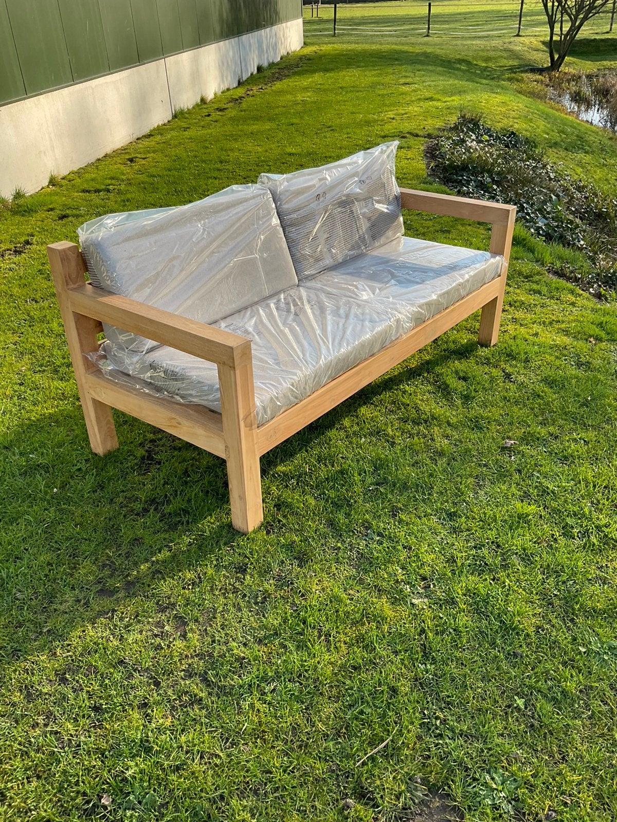 Nieuwe teak houten tuinbank met dikke kussens, Ophalen, Zo goed als nieuw, Teakhout