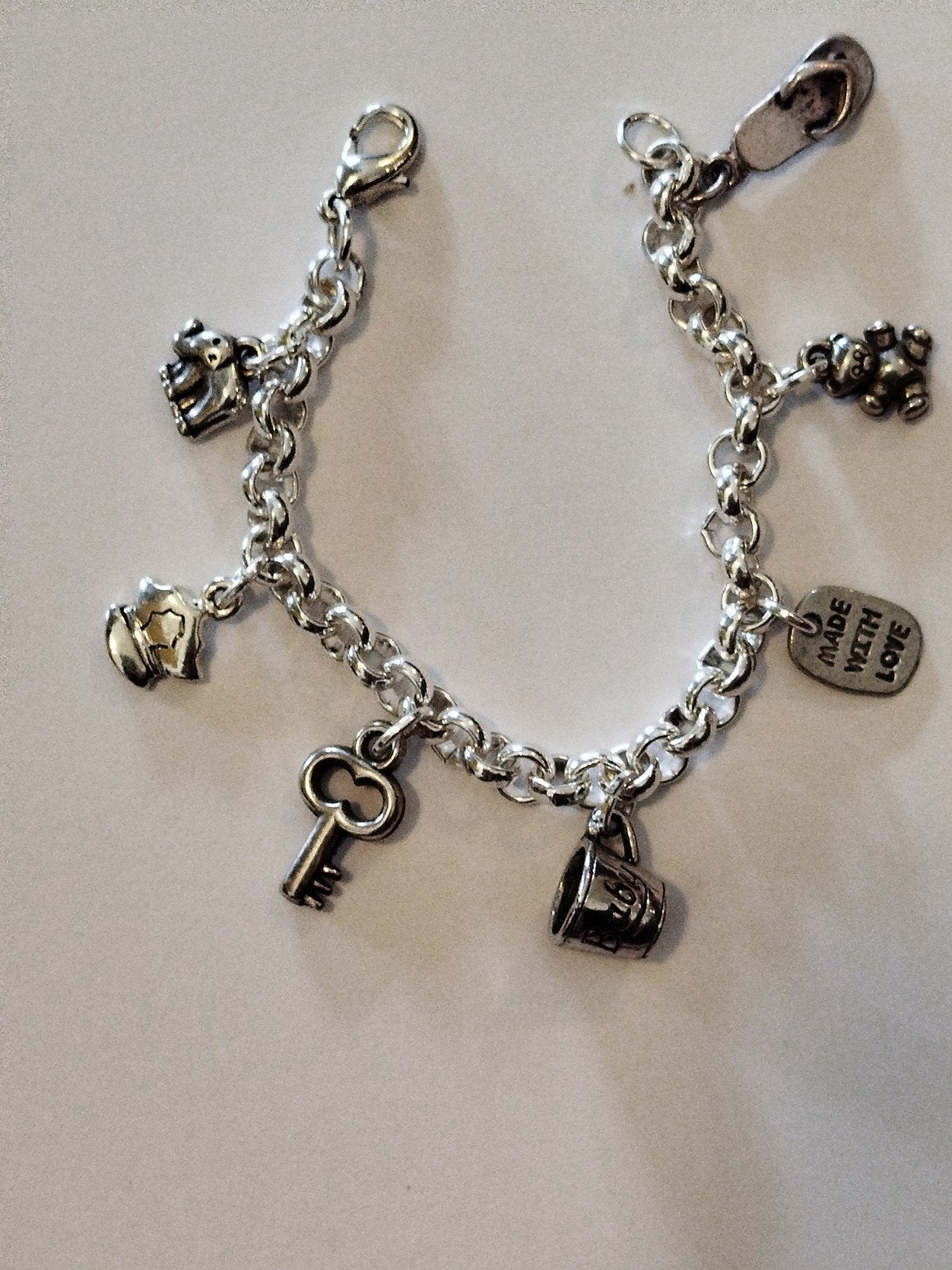 Leuke kinder bedelarmband met diverse bedels, Sieraden, Tassen en Uiterlijk, Overige materialen, Gebruikt, Ophalen of Verzenden