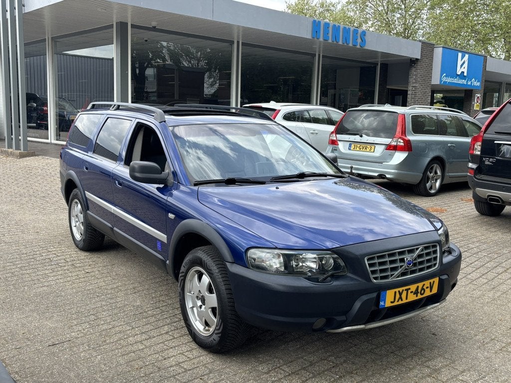 Volvo XC70 2.4T AWD Aut OCEAN RACE Schuifdak Xenon BTW voord, Auto's, Volvo, Blauw, XC70, Automatische klimaatregeling, Leder