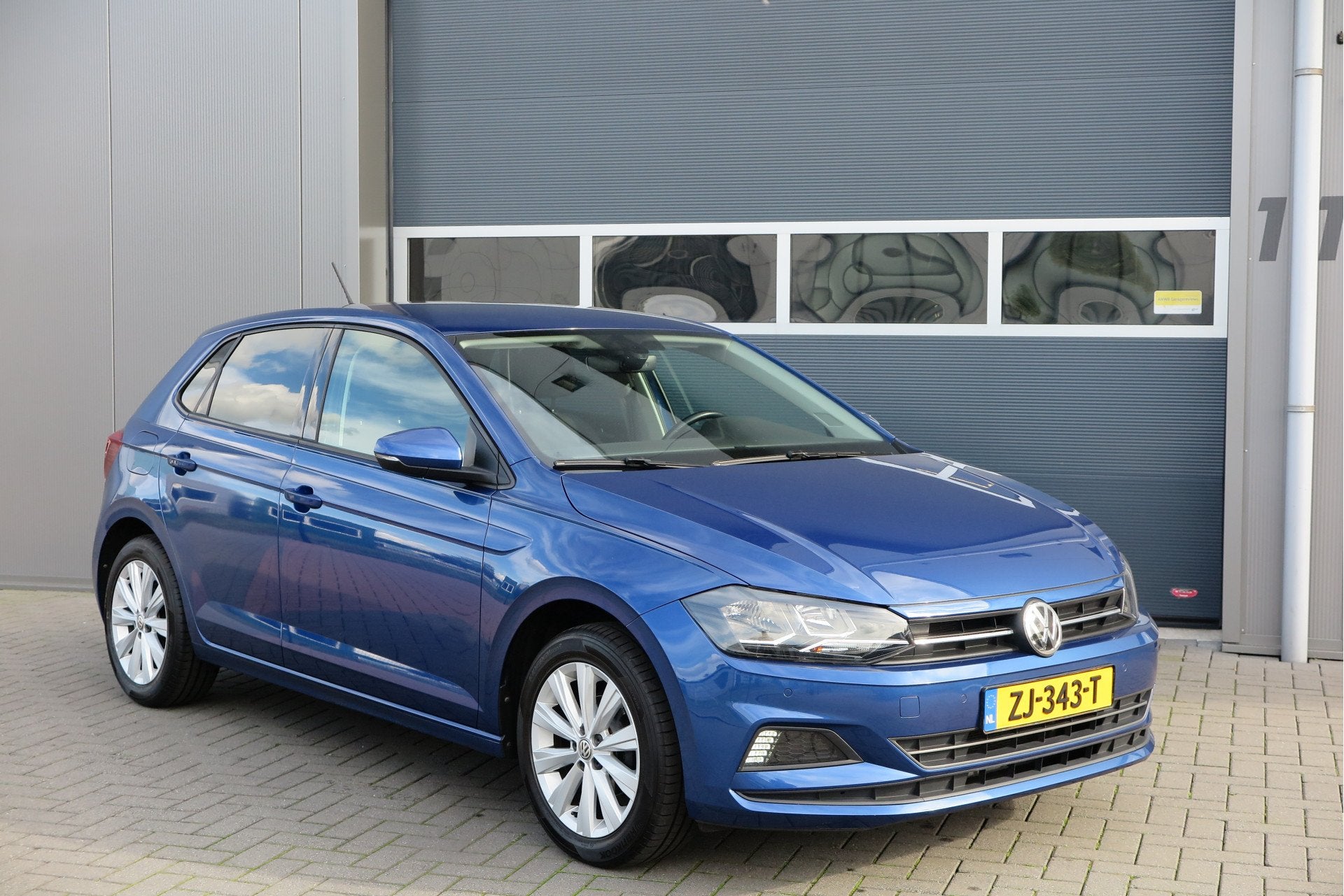 Volkswagen Polo 1.0 TSI 95pk Highline Trekhaak (afneembaar), Auto's, Volkswagen, Stof, Gebruikt, 1045 kg, Blauw