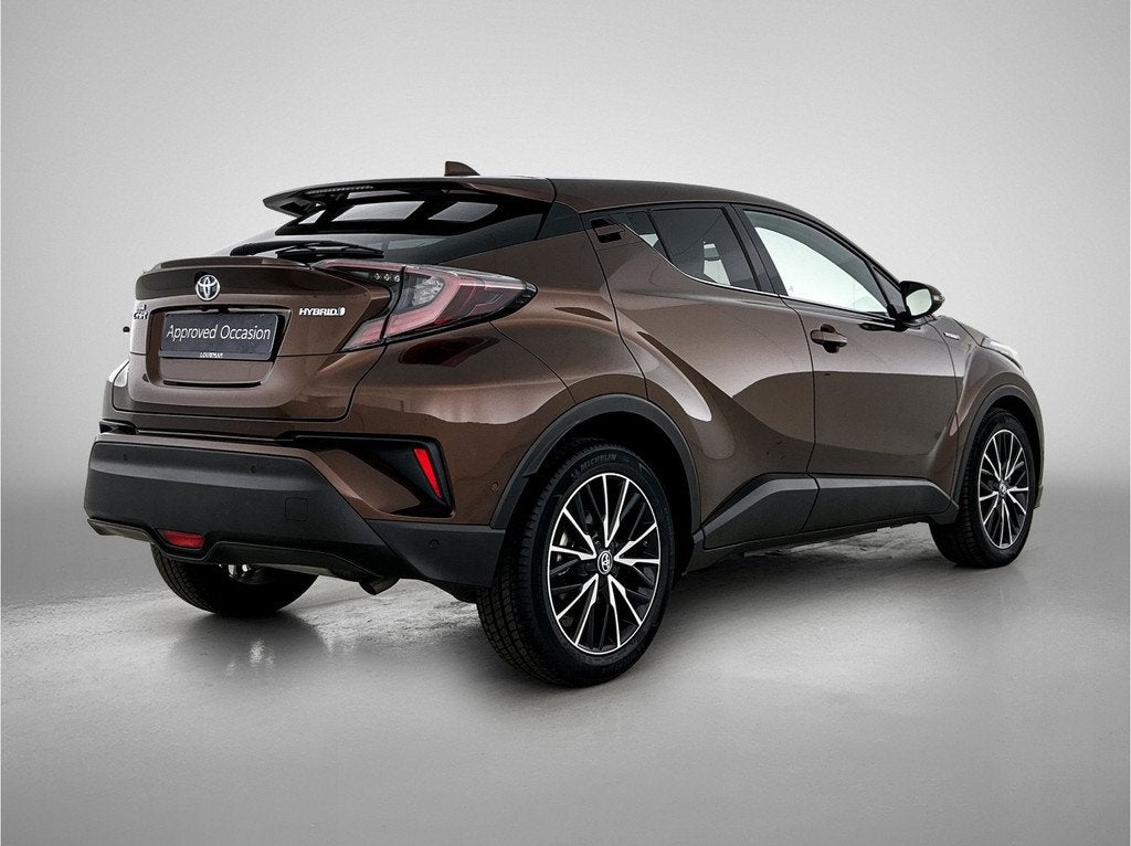 Toyota C-HR 1.8 Hybrid Premium | Dealer onderhouden | JBL |, Auto's, 12 maanden, 4 cilinders, 122 pk, Leder