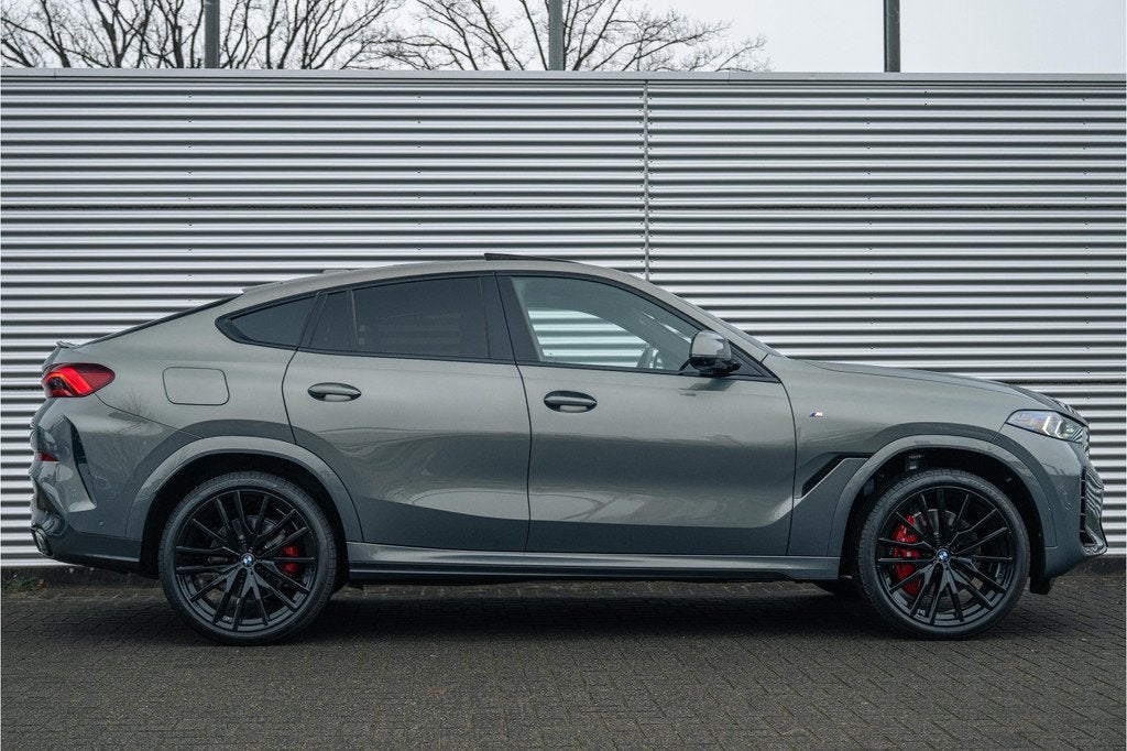 BMW X6 xDrive40i M Sport Automaat / Panoramadak / Trekhaak /, Auto's, BMW, Automaat, Zwart, Bedrijf, 2998 cc