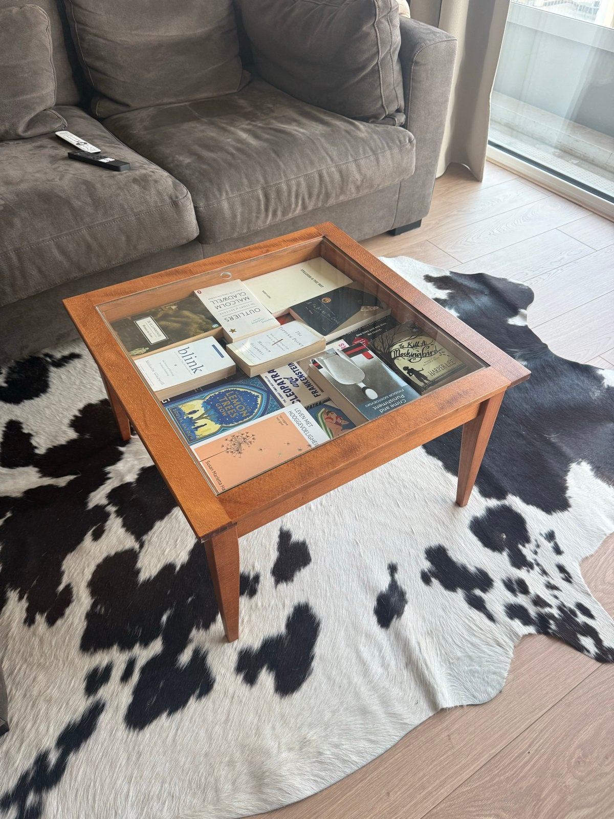 Salontafel met glazen blad en opbergruimte, Ophalen, Gebruikt, 100 tot 150 cm, Vierkant