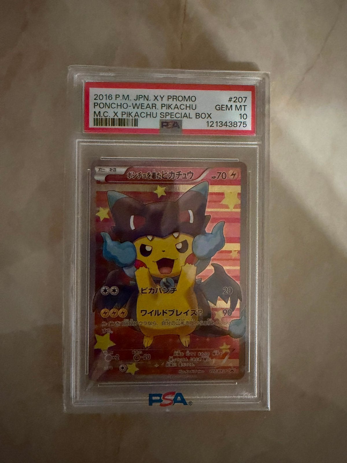 Pikachu Poncho Charizard X PSA 10 GEM MT Promo Kaart, Ophalen of Verzenden, Nieuw, Losse kaart, Foil