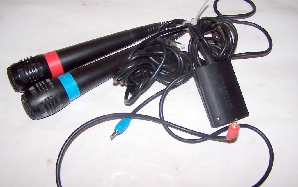 2 originele Sony Singstar microfoons met adapter. Nieuwstaat, Spelcomputers en Games, Ophalen of Verzenden, Zo goed als nieuw