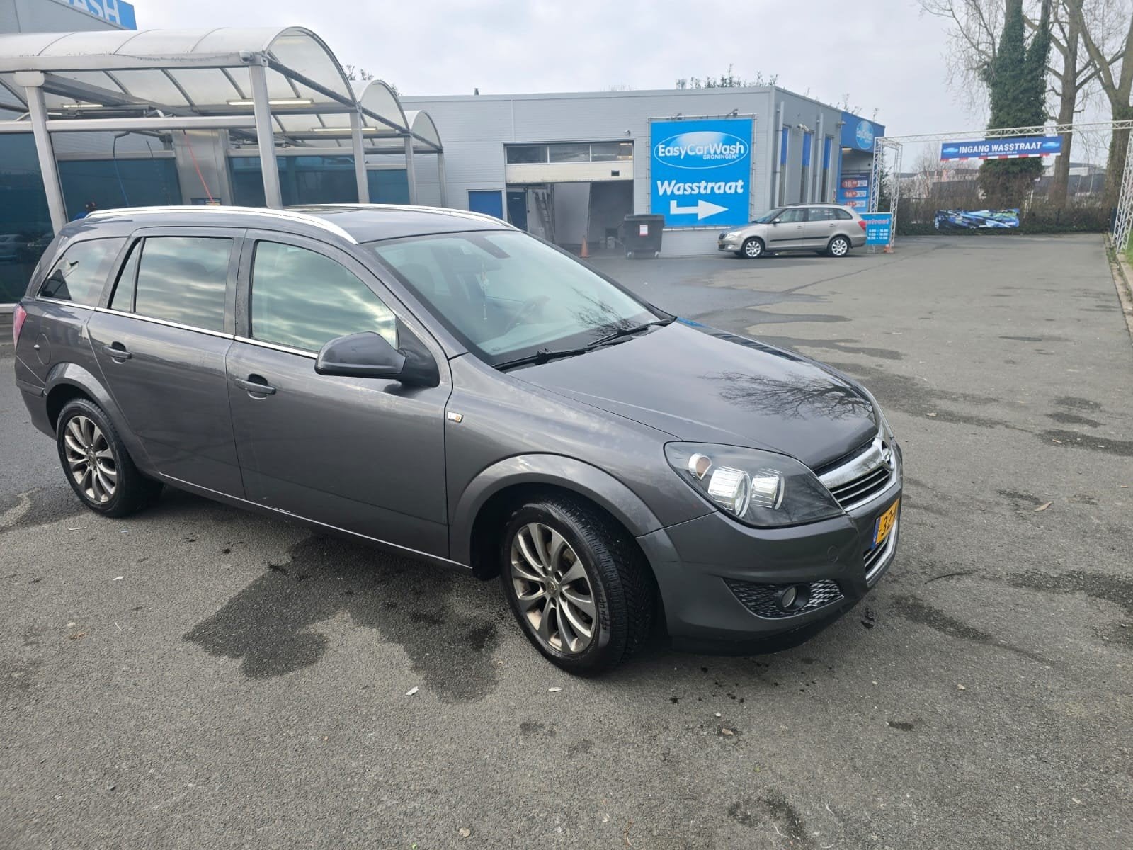 Opel Astra 1.6 16V 85KW St.wgn. 2010 Grijs met 4nieuw banden, Voorwielaandrijving, Origineel Nederlands, Stationwagon, 115 pk