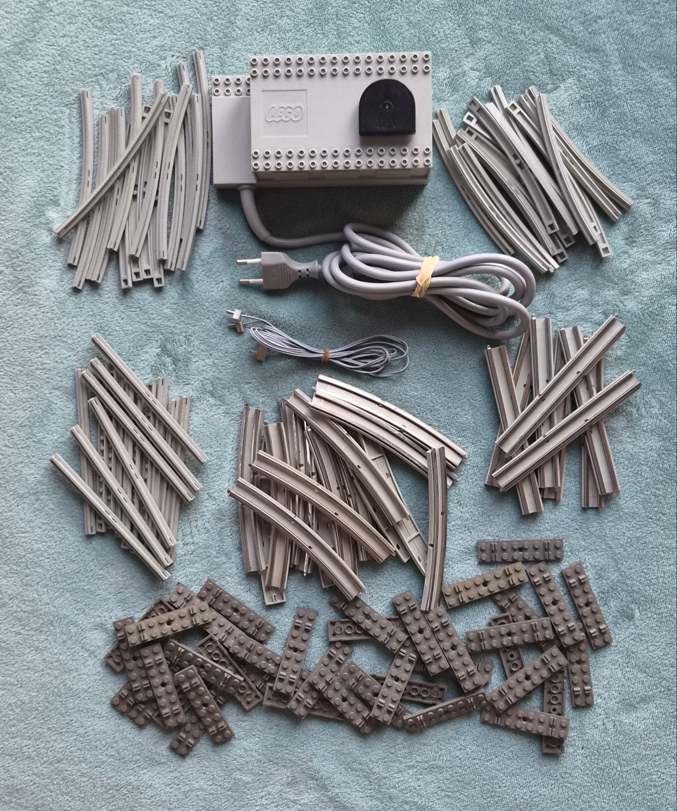 Lego trein 12 Volt grijze rails + transformator (set 7864), Gebruikt, Lego, Ophalen of Verzenden, Losse stenen