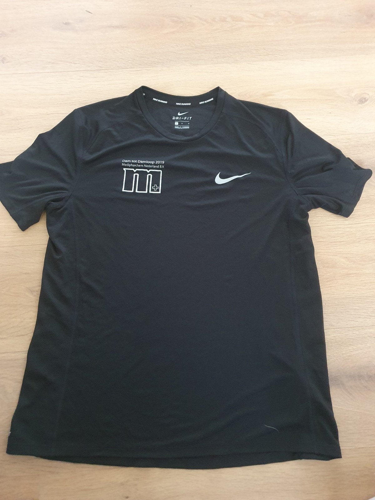Nike hardloopshirt Dam tot Damloop 2019 - Maat L, Nike, Ophalen of Verzenden, Zo goed als nieuw, Kleding