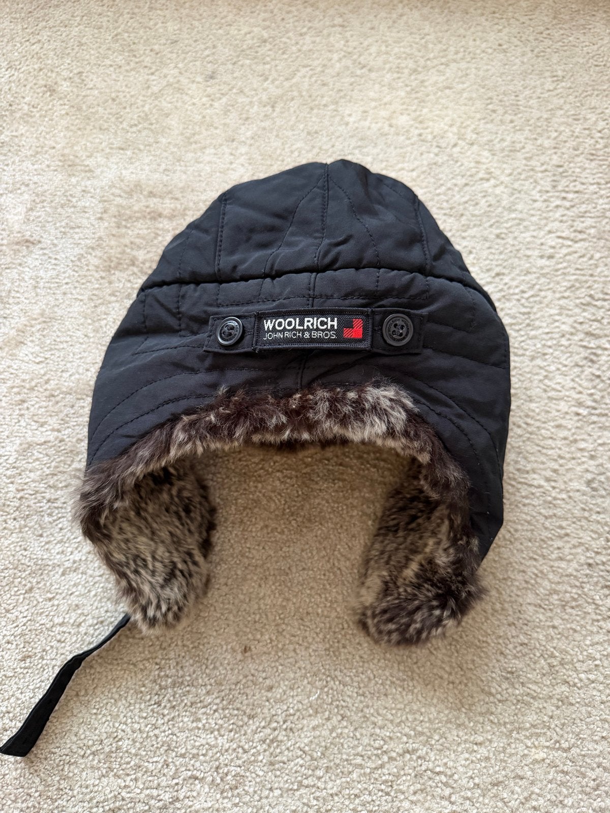Warme Woolrich kinderhoed met bont - Maat M, Kinderen en Baby's, Kinderkleding | Mutsen, Sjaals en Handschoenen, Ophalen of Verzenden