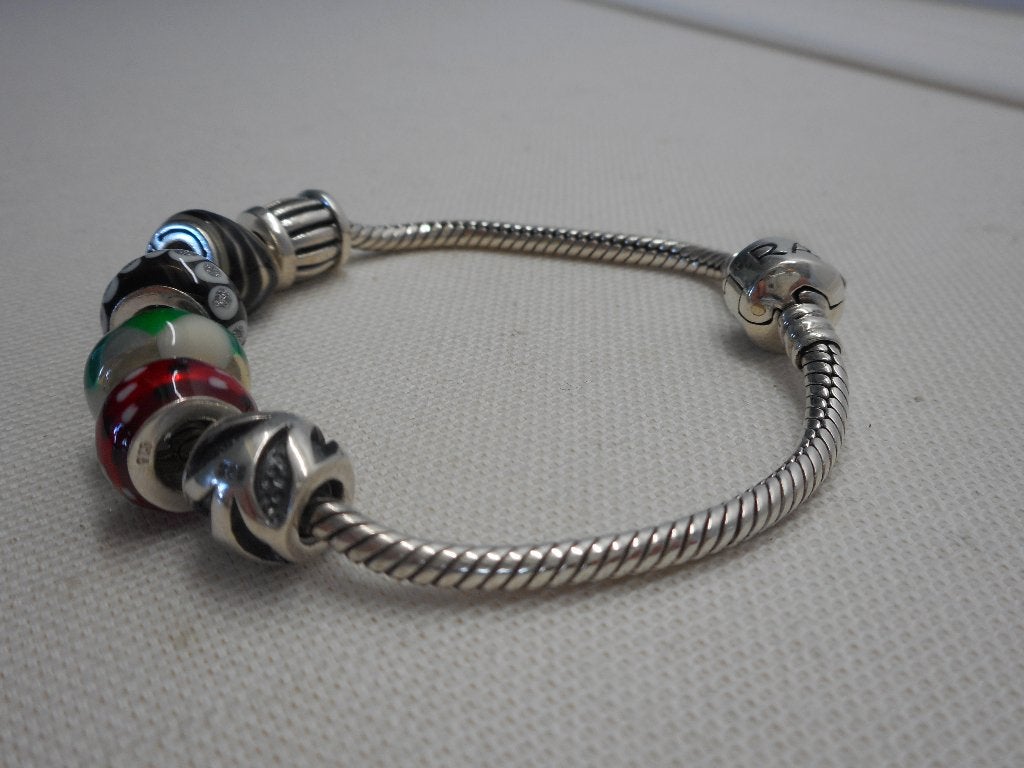 Zilveren Amora armband met 6 bedels nr.345, Verzenden, Zo goed als nieuw, Met bedels of kralen, Zilver